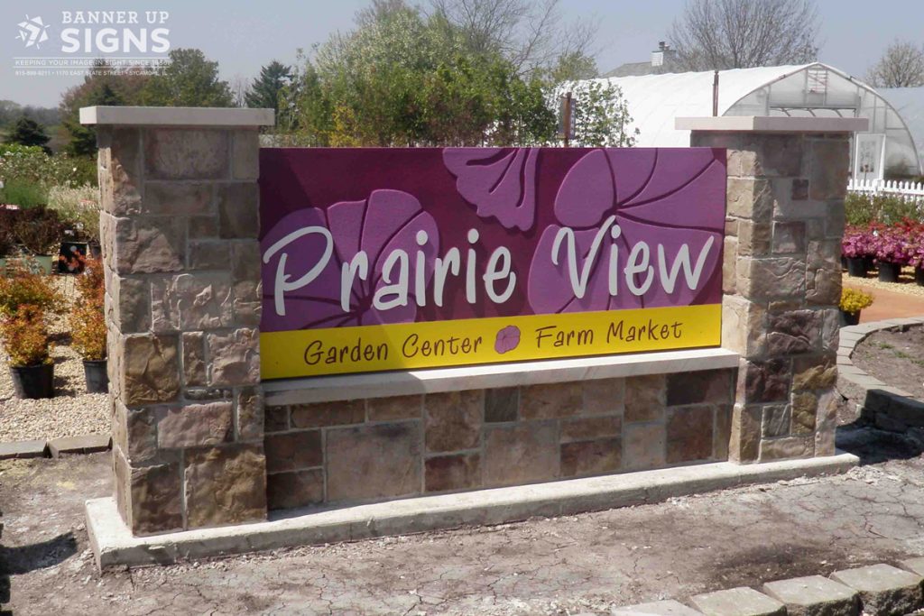 Large monument sign with dimensional graphics and text for Prairie View Garden Center.