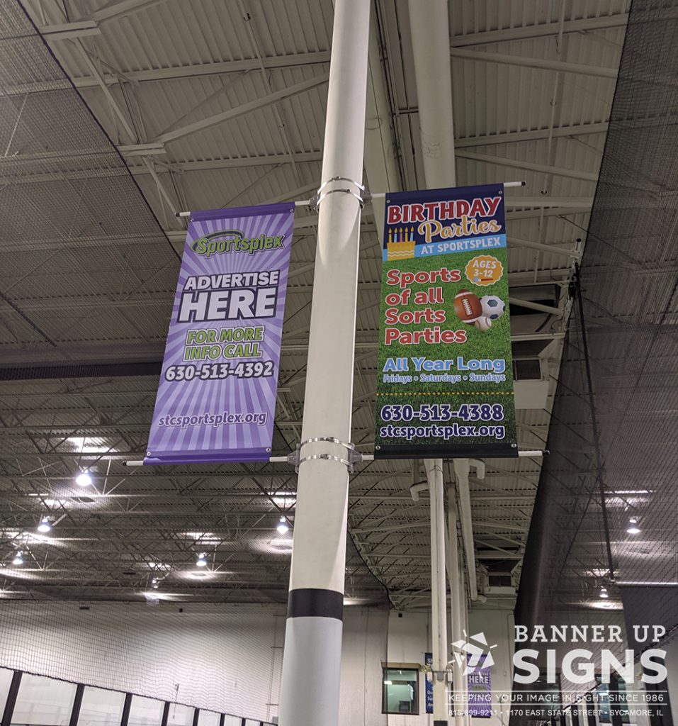 Customer indoor pole banners by Banner Up Signs