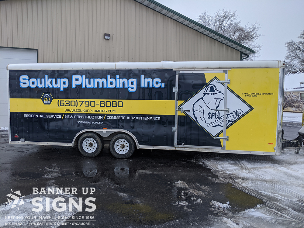 A large trailer wrap for Soukup Plumbing really makes an everyday trailer the perfect mobile billboard for their business.