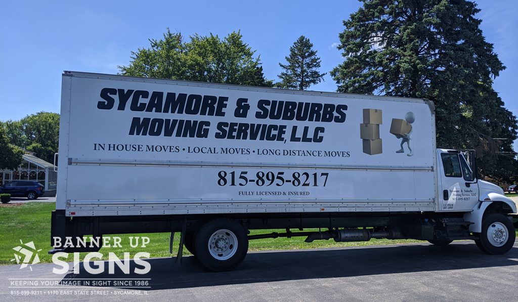 A large moving van showcases the companies logo and contact information to help clients easily locate their service.