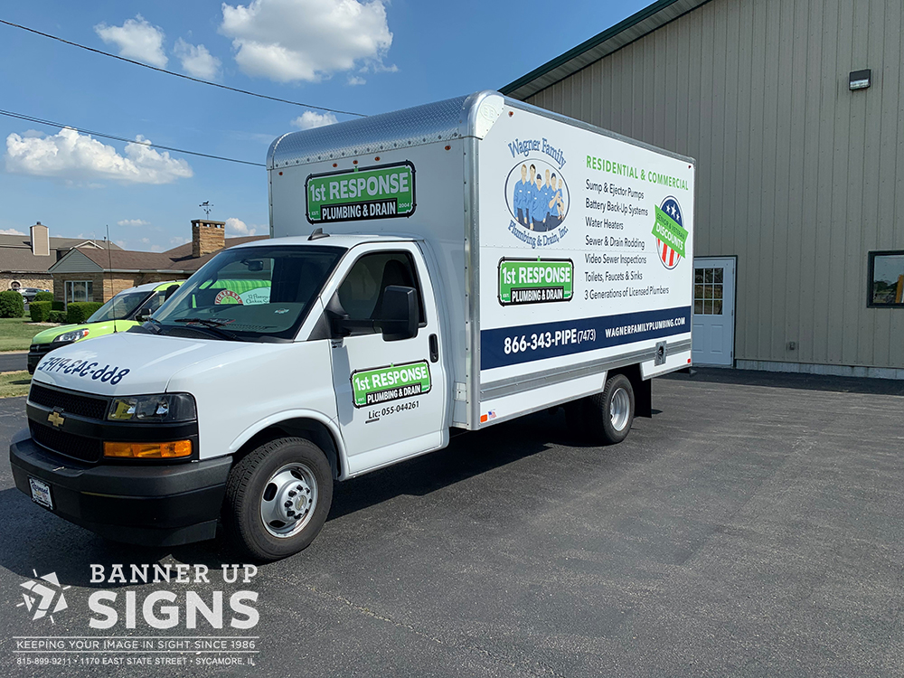 1st Response Plumbing's custom box truck lettering lists their most common services with their contact information.