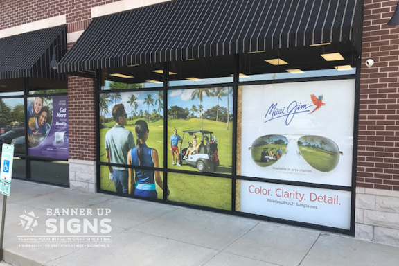 Full coverage window graphics create privacy for a business while also advertising their services.