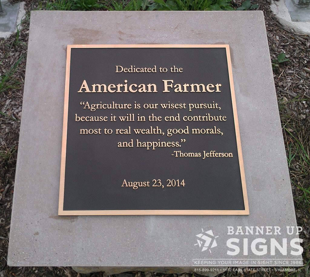 A bronze plaque mounted to cement makes a lasting impact.