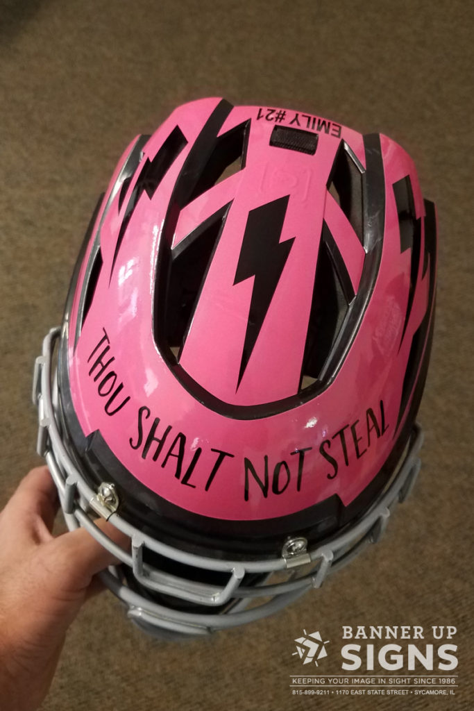 Banner Up Signs creates customized helmet wraps for sports helmets