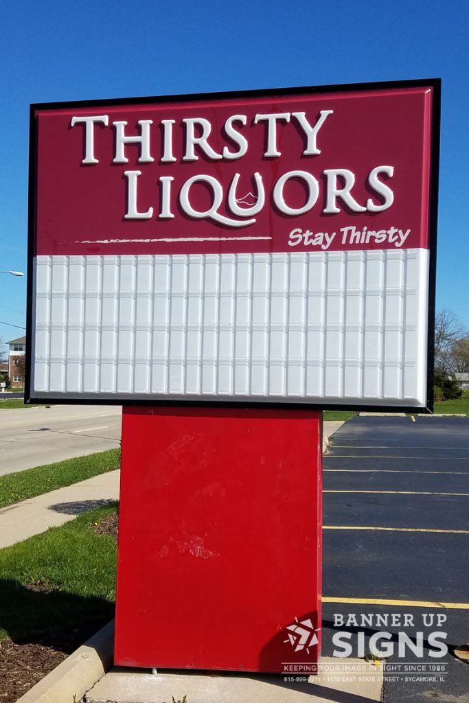 A road sign with dimensional text for thirsty liquors allows changeable text for their specials.