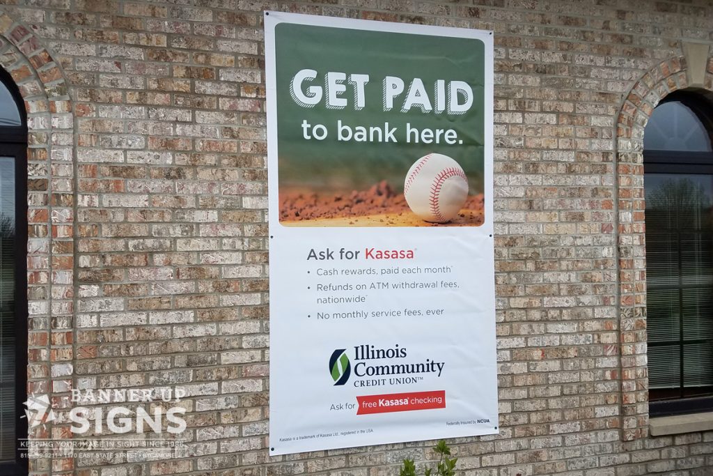 Outdoor banner created by Banner Up that advertises a bank's interest rates