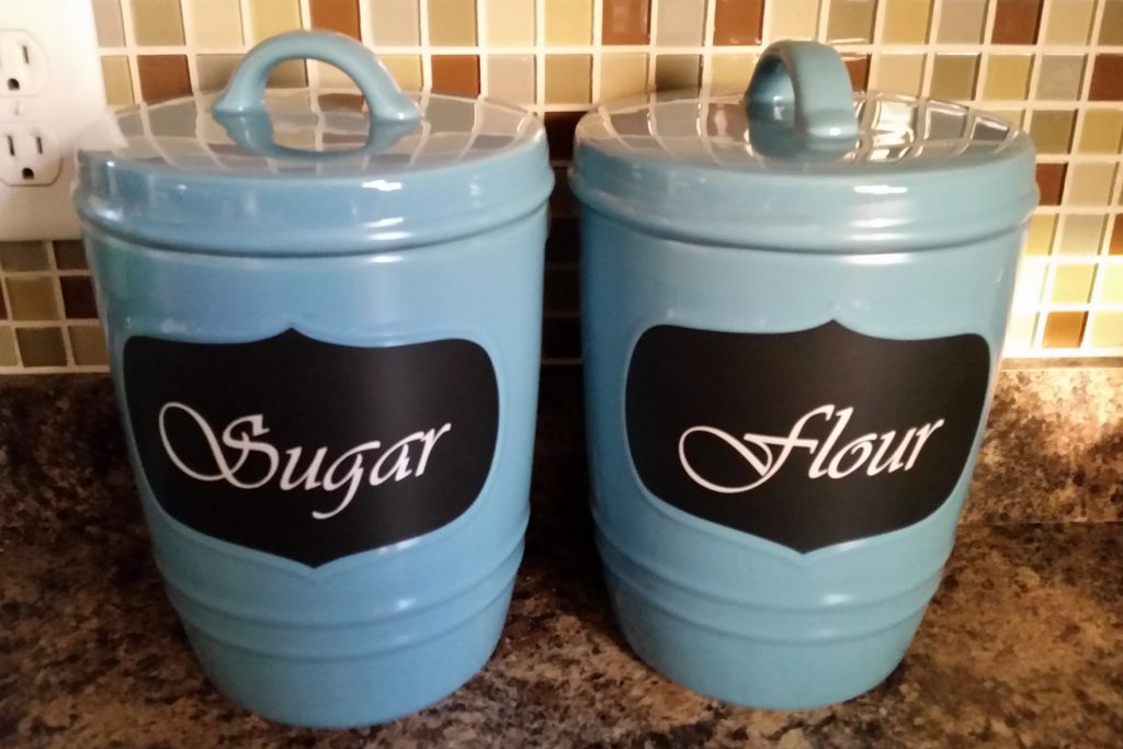 Vinyl decals for personalized kitchen canisters created by Banner Up Signs